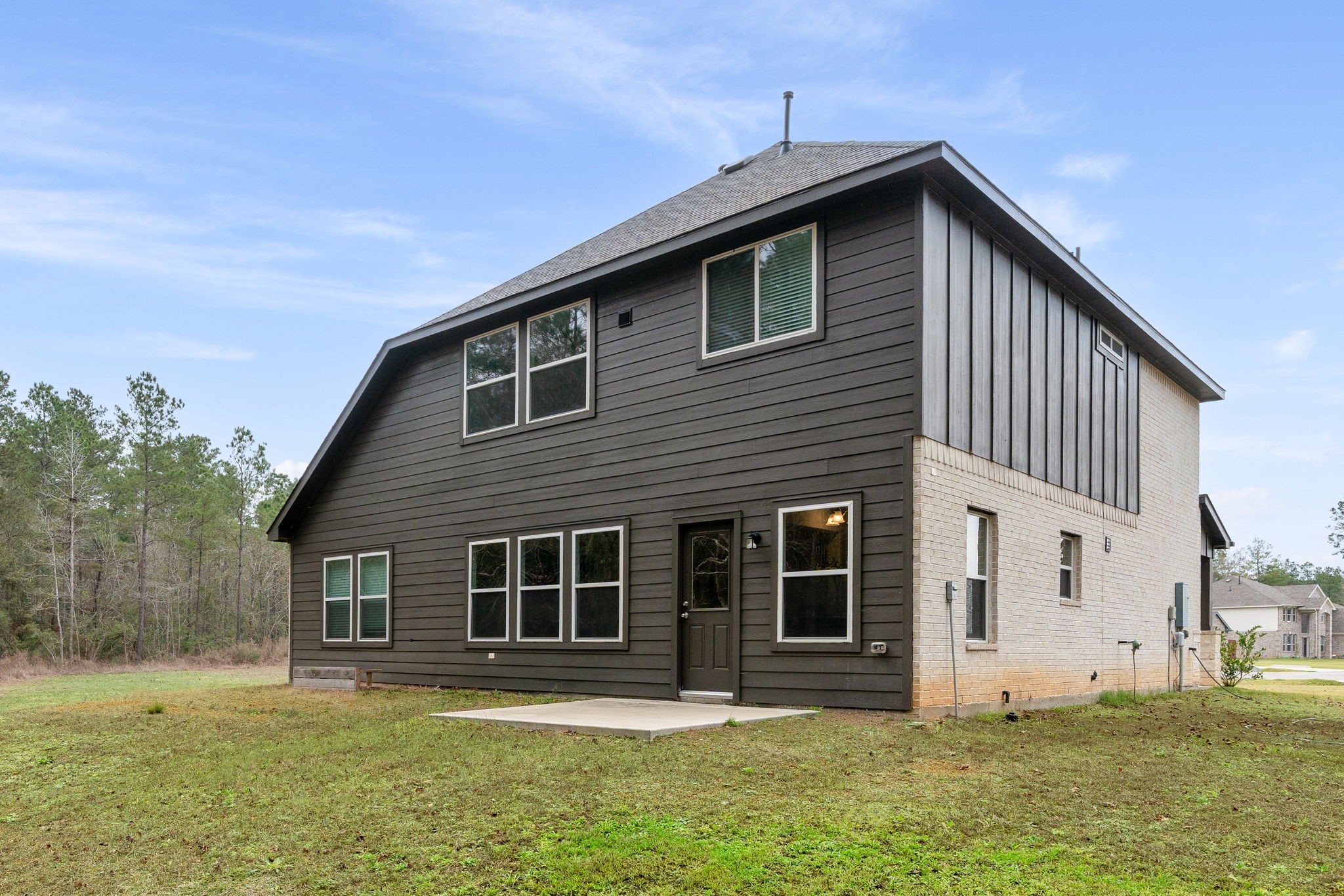 16680 Rockwall Street Conroe, TX 77303 - Photo 29 of 38 Back patio slab already for you to create your back yard oasis.