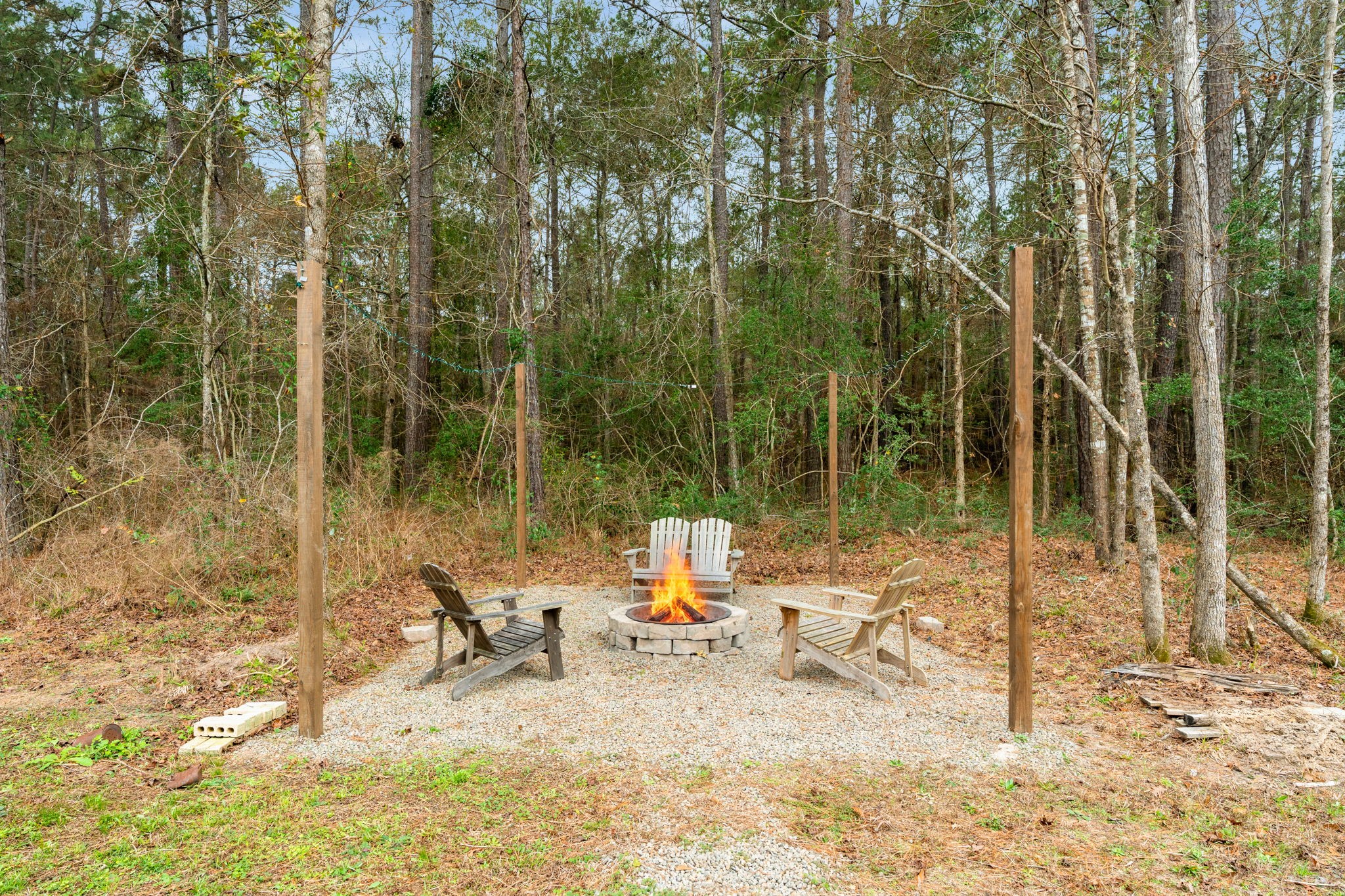 16680 Rockwall Street Conroe, TX 77303 - Photo 32 of 38 Relax by the fire at night enjoying the stars and country atmosphere.