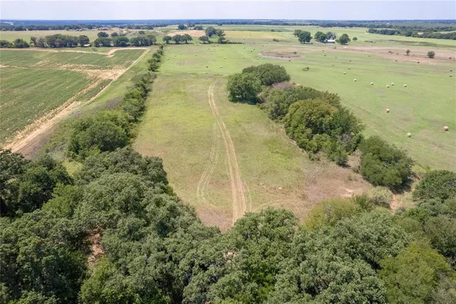 a view of a lake with a big yard