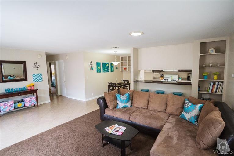 169 Ripley Street Camarillo, CA 93010 - Photo 1 of 17 a living room with furniture and a flat screen tv