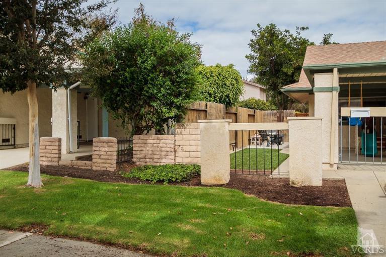 169 Ripley Street Camarillo, CA 93010 - Photo 12 of 17 a view of house with backyard and a garden