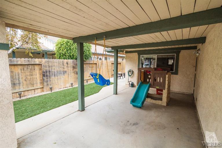 169 Ripley Street Camarillo, CA 93010 - Photo 14 of 17 a view of a porch with furniture and a table