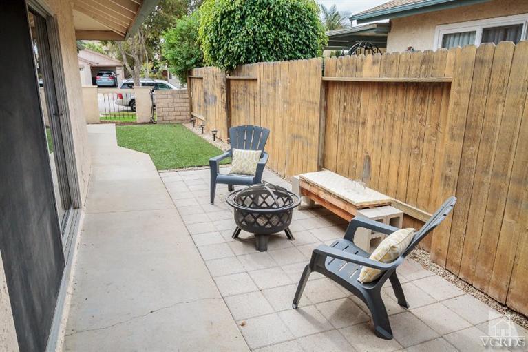 169 Ripley Street Camarillo, CA 93010 - Photo 15 of 17 a backyard of a house with table and chairs