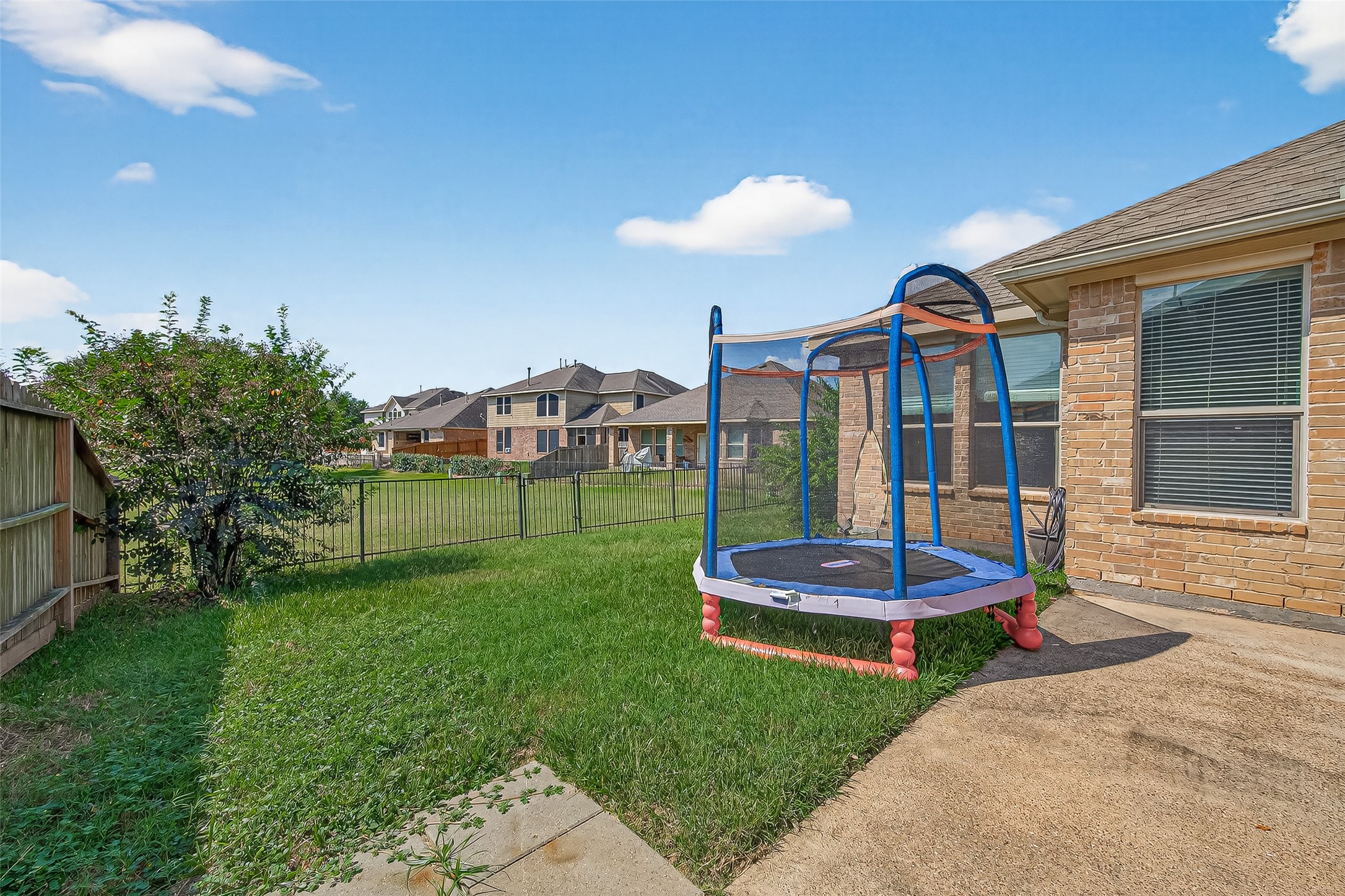 2019 Preston Park Rosenberg, TX 77471 - Photo 27 of 31 a view of a house with a backyard porch and sitting area