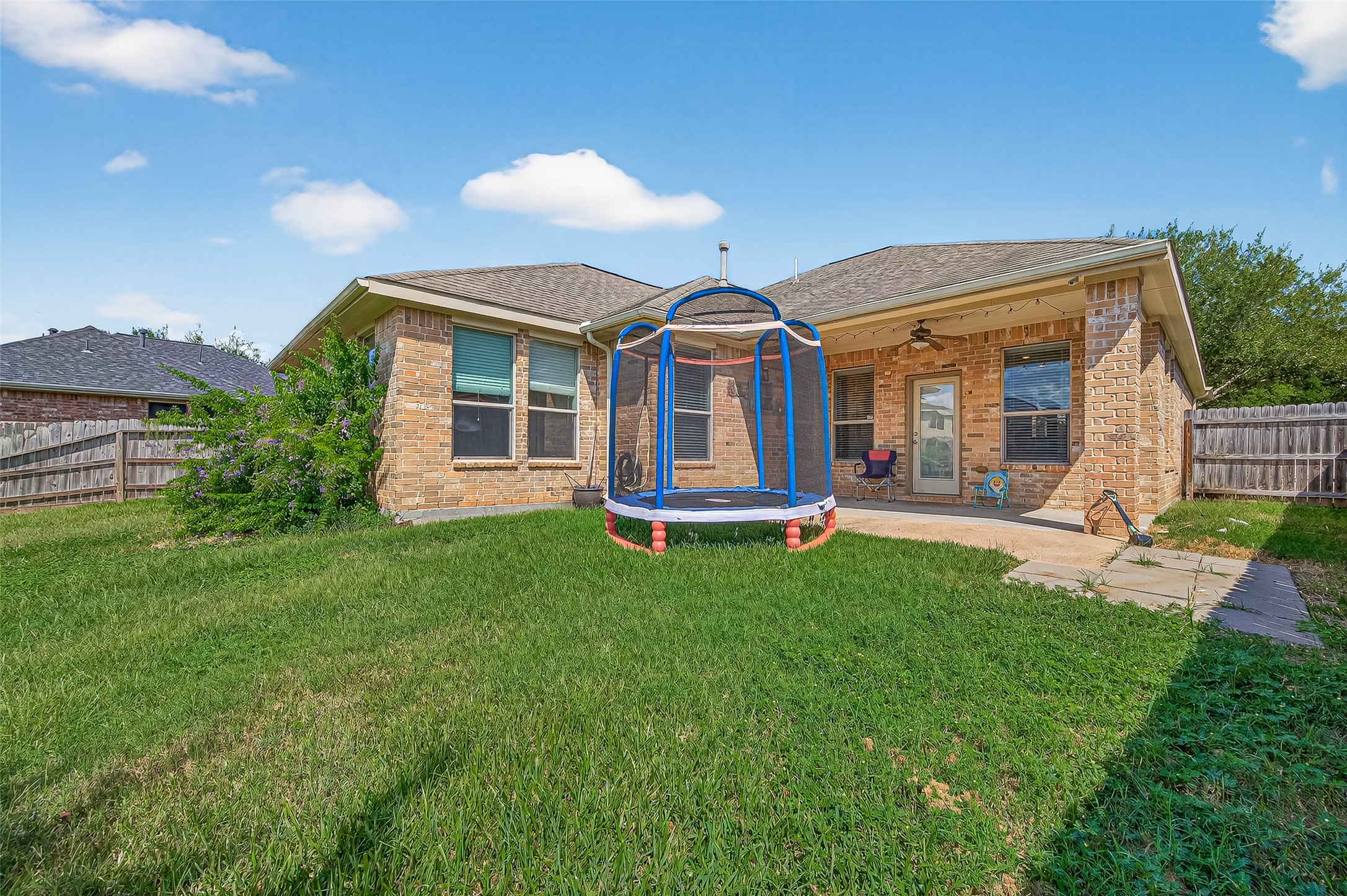 2019 Preston Park Rosenberg, TX 77471 - Photo 28 of 31 a front view of a house with a yard