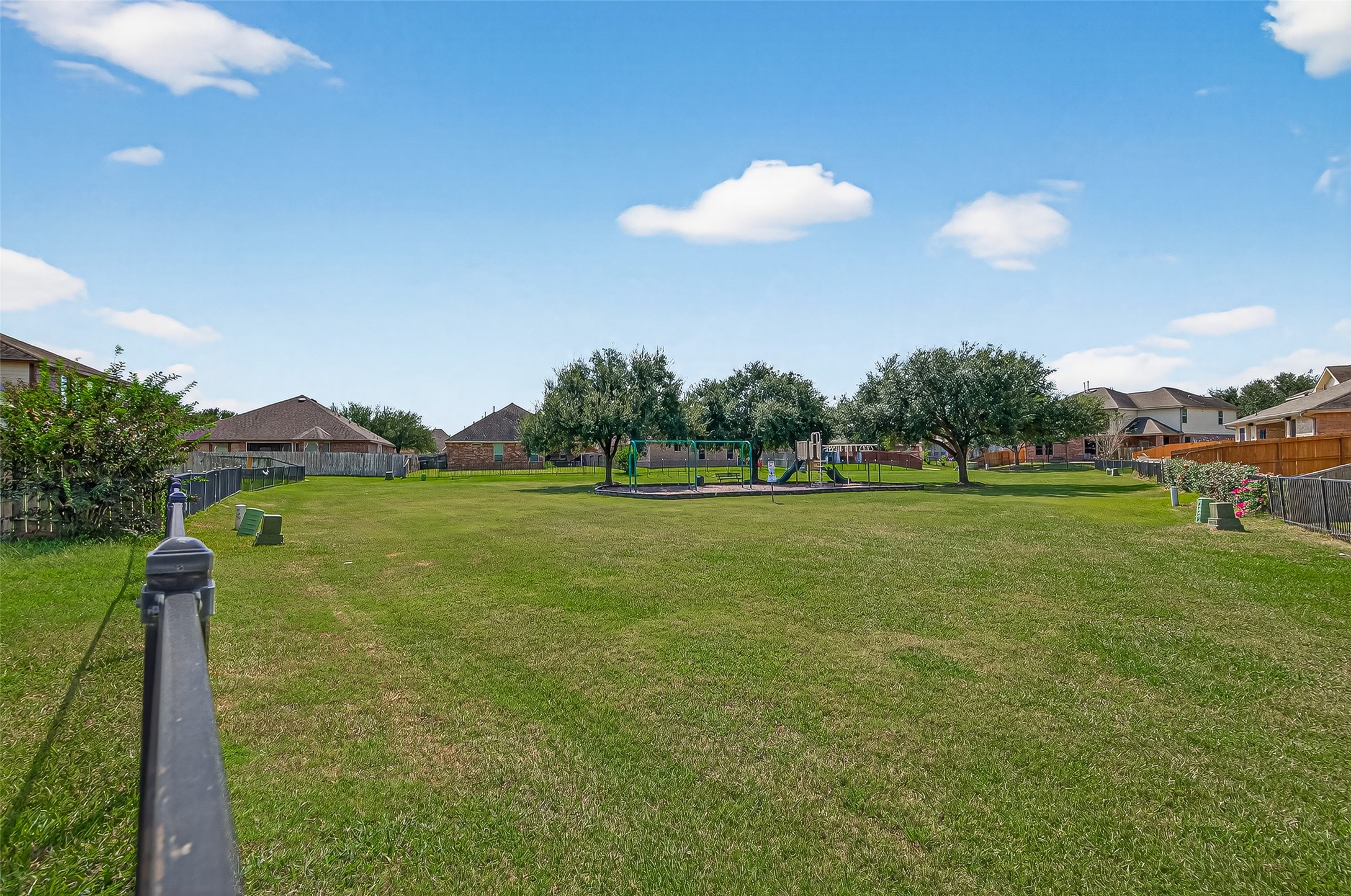 2019 Preston Park Rosenberg, TX 77471 - Photo 29 of 31 a view of a golf course with a lake