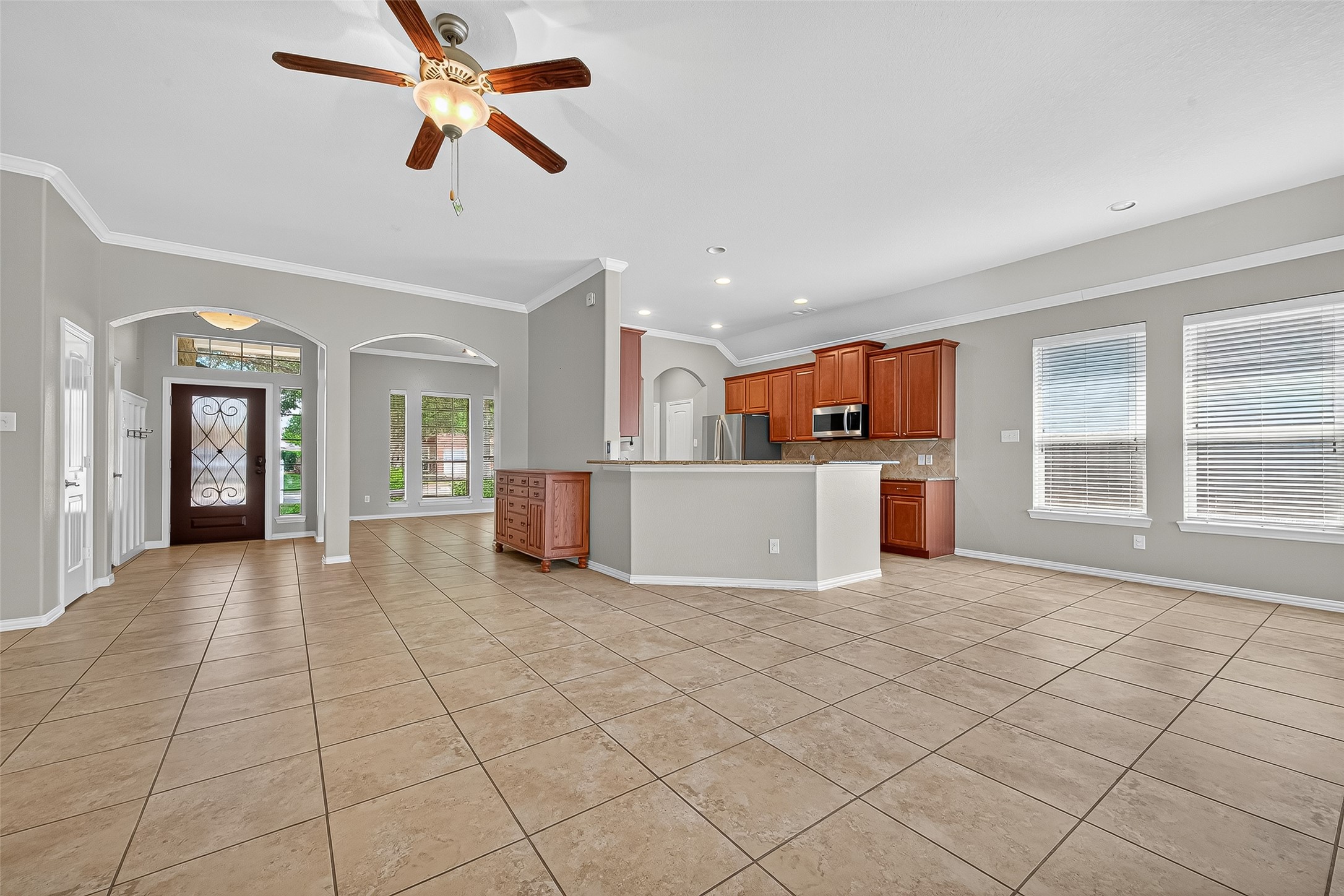 2019 Preston Park Rosenberg, TX 77471 - Photo 7 of 31 a view of a kitchen with furniture and a window