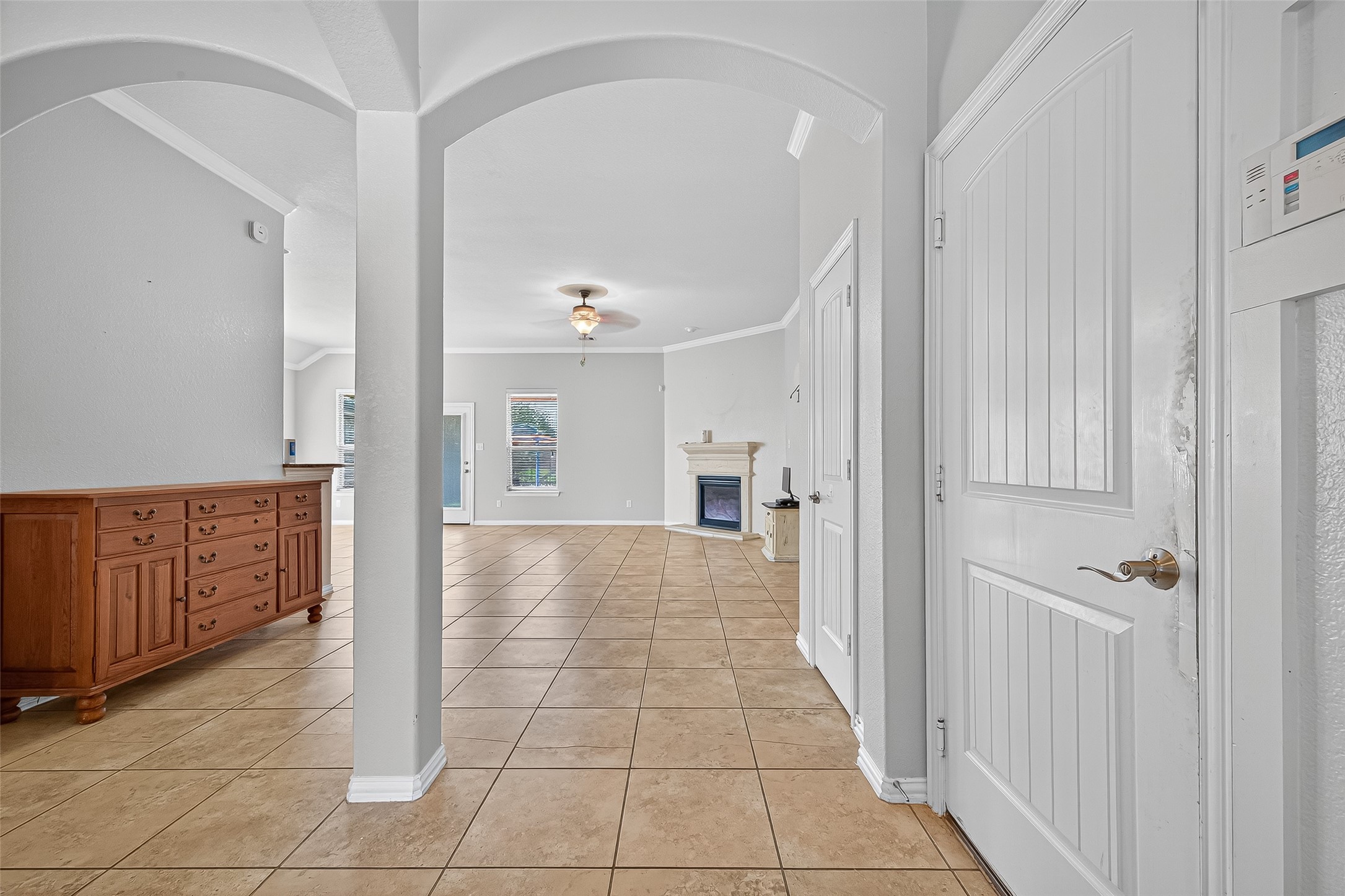 2019 Preston Park Rosenberg, TX 77471 - Photo 9 of 31 a view of a hallway with wooden cabinet