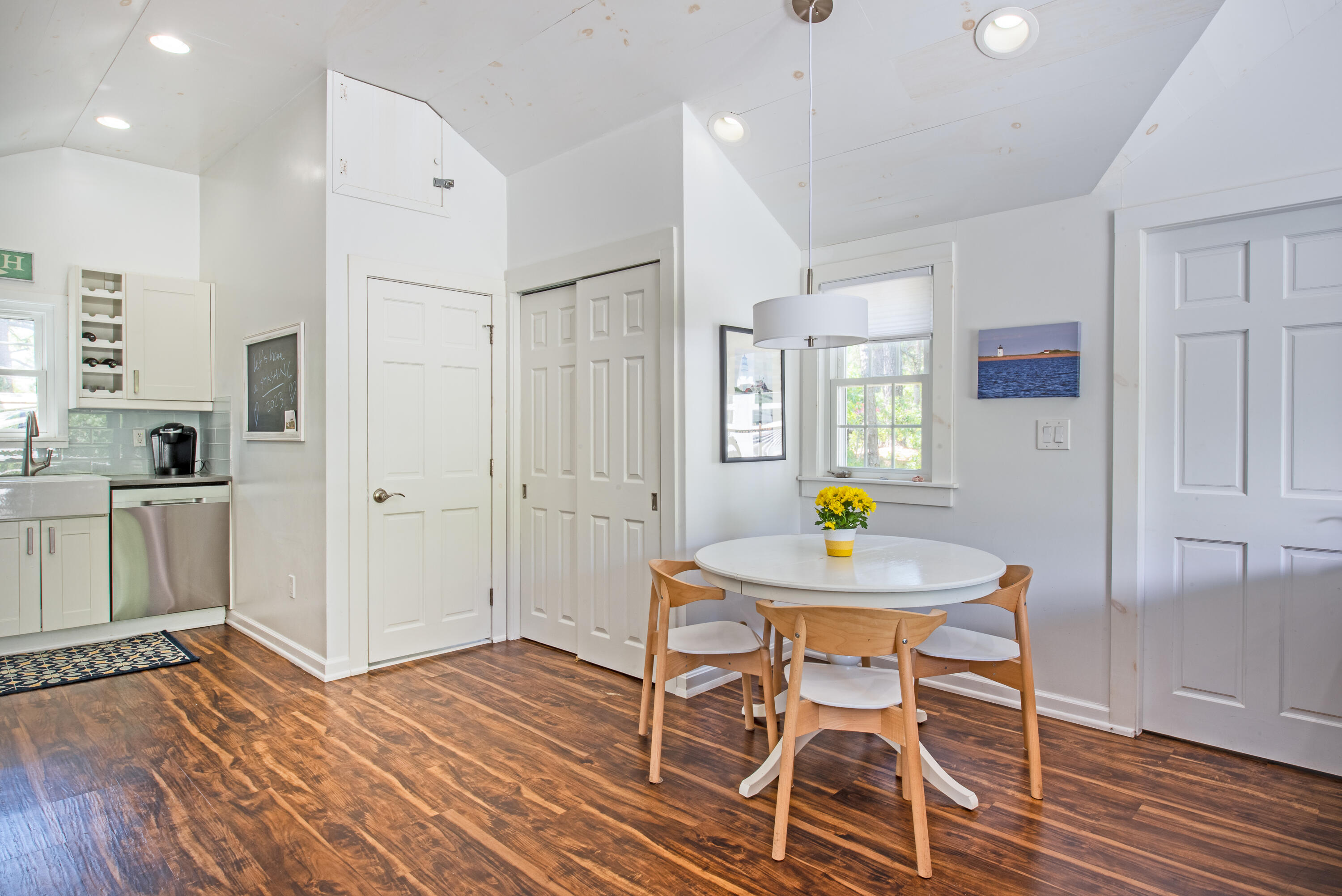 7 Great Hollow Road, Unit 38 Truro, MA 02666 - Photo 12 of 28 a view of a dining room with furniture and wooden floor