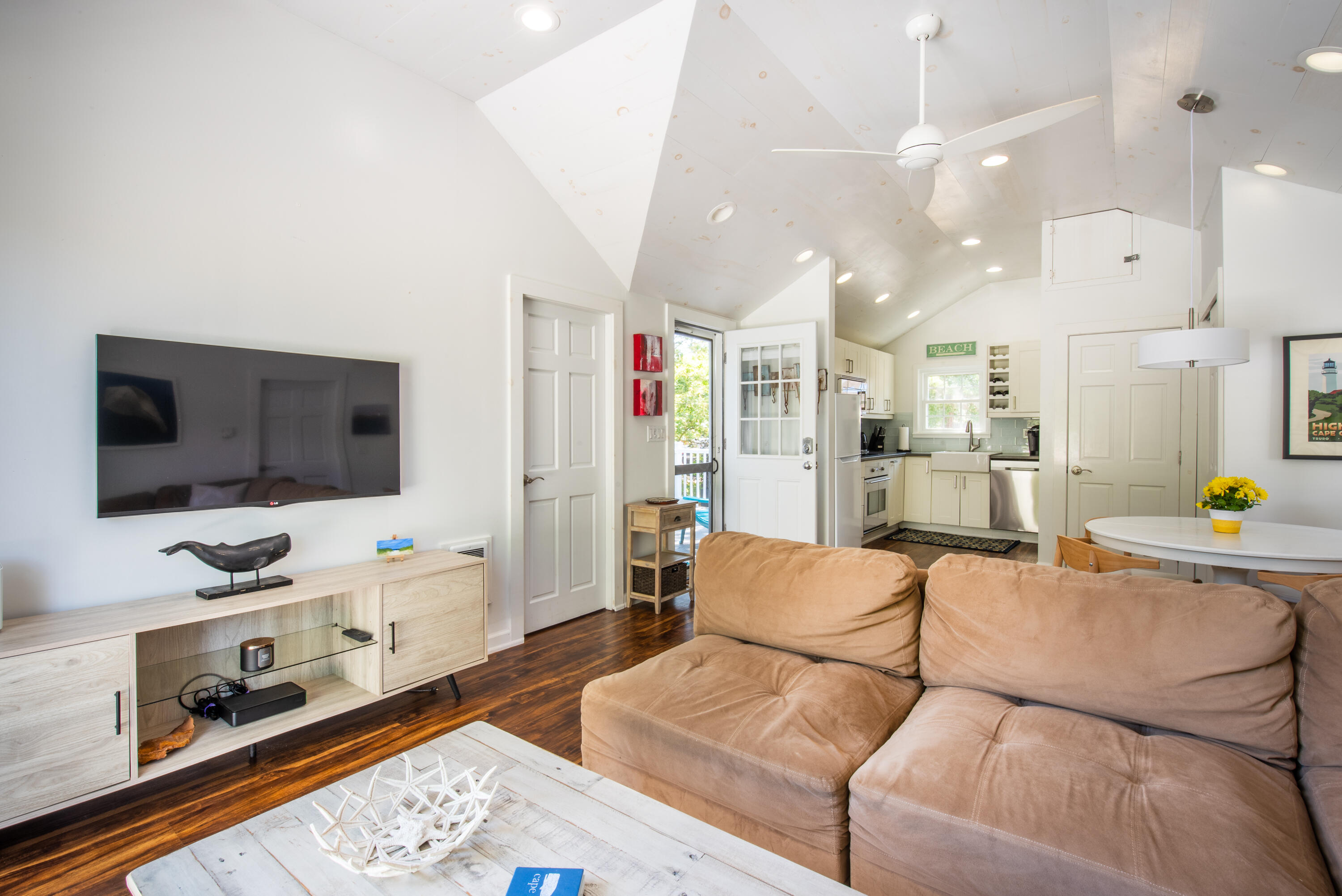 7 Great Hollow Road, Unit 38 Truro, MA 02666 - Photo 15 of 28 a living room with furniture and a flat screen tv