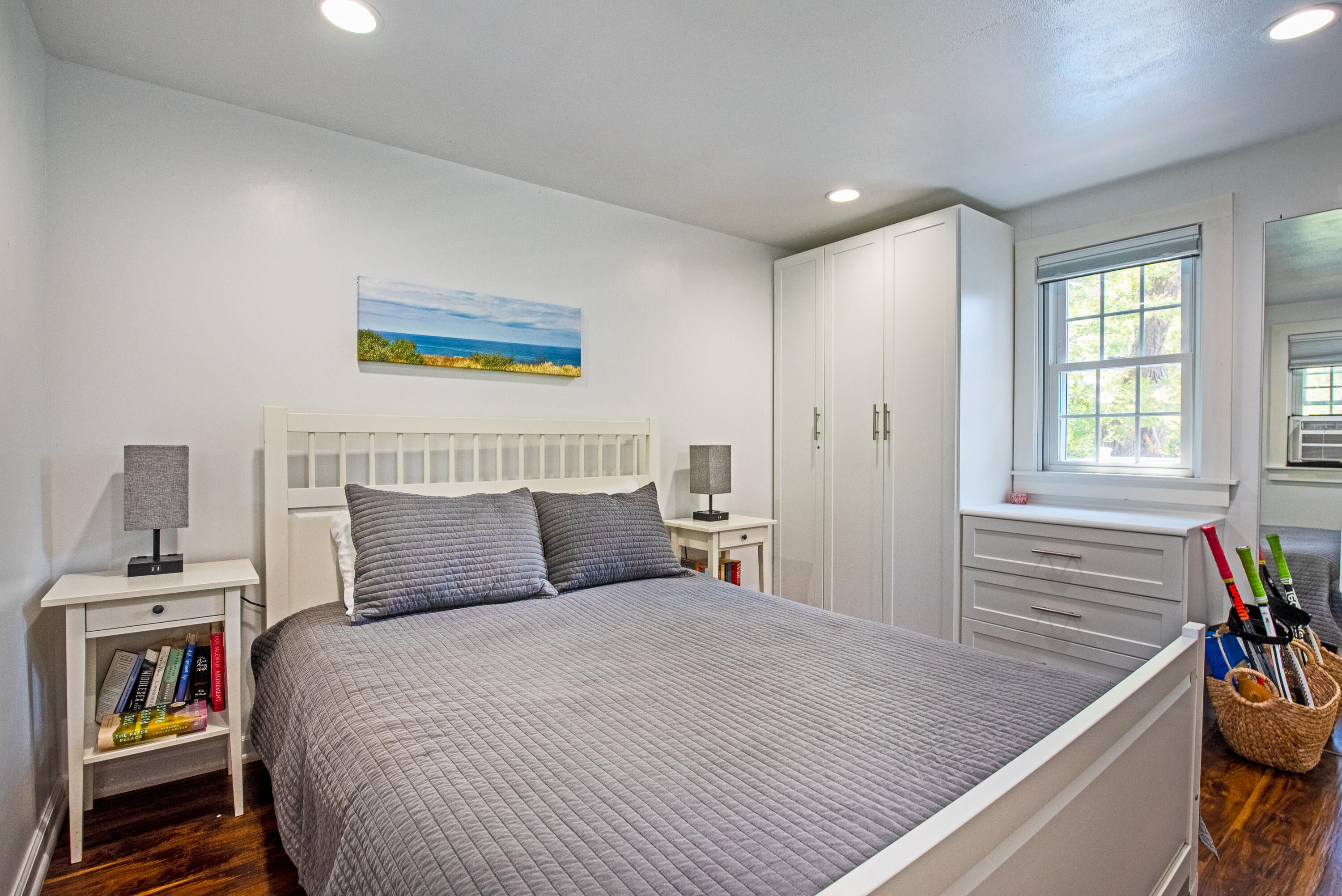 7 Great Hollow Road, Unit 38 Truro, MA 02666 - Photo 21 of 28 a bedroom with a bed and a book shelf