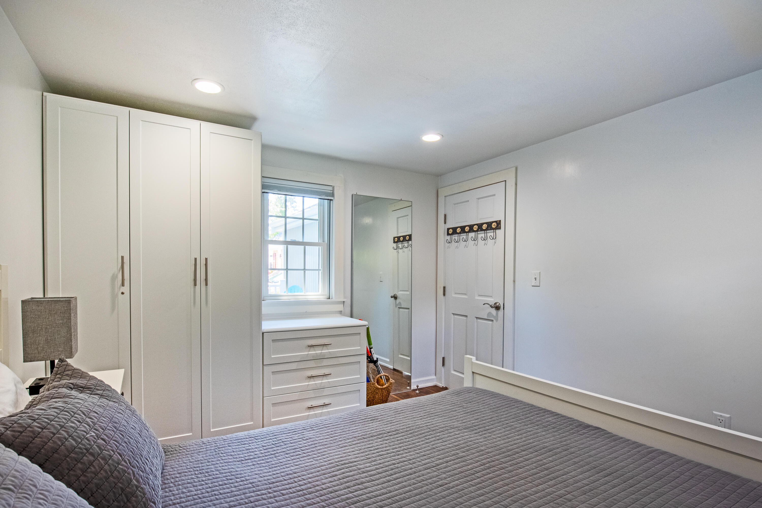 7 Great Hollow Road, Unit 38 Truro, MA 02666 - Photo 22 of 28 a view of a bedroom with wooden floor and closet