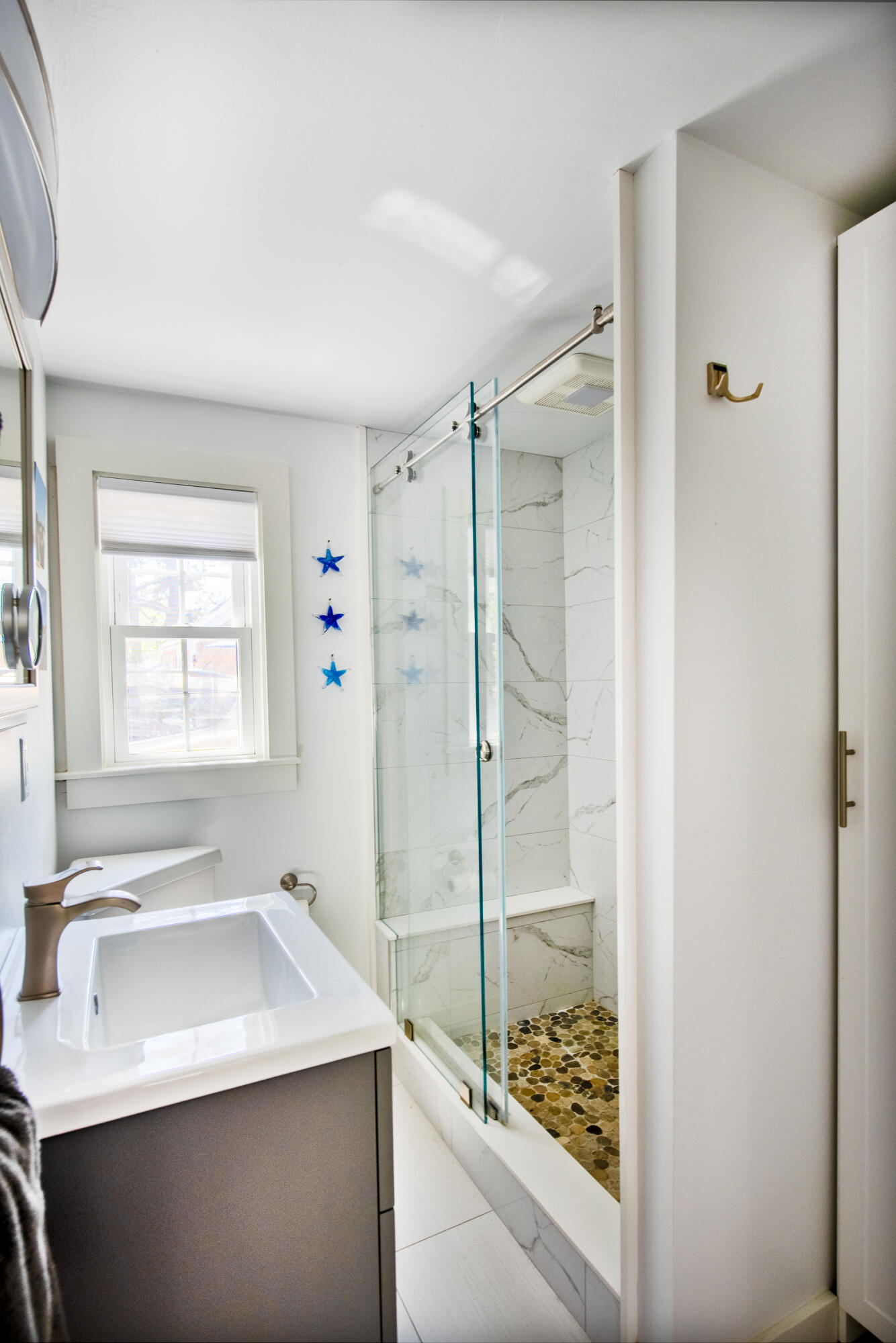 7 Great Hollow Road, Unit 38 Truro, MA 02666 - Photo 23 of 28 a bathroom with a sink and a shower
