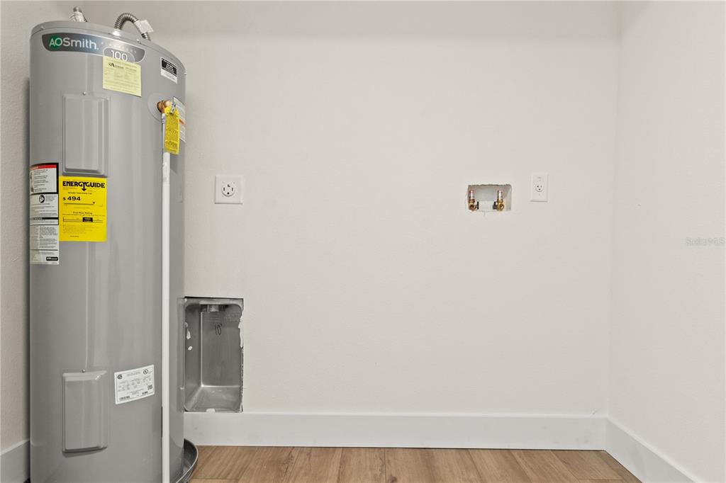 14348 Graham Street Dade City, FL 33523 - Photo 28 of 36 a bathroom with a window and a shower