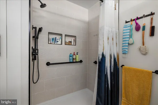 an aerial view of a house with garden space and sitting space