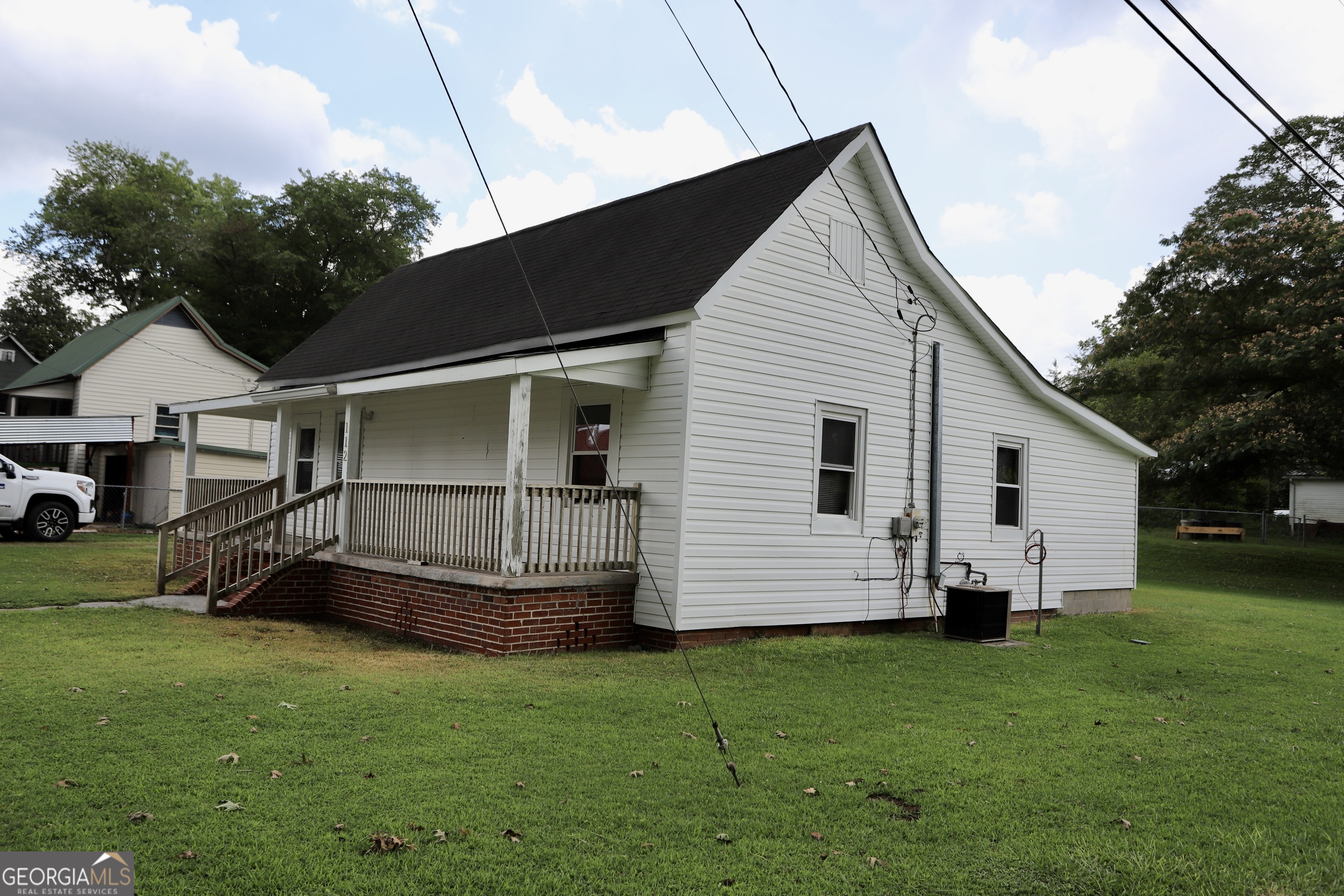 112 7th Street Trion, GA 30753 - Photo 5 of 28 a front view of a house with a garden