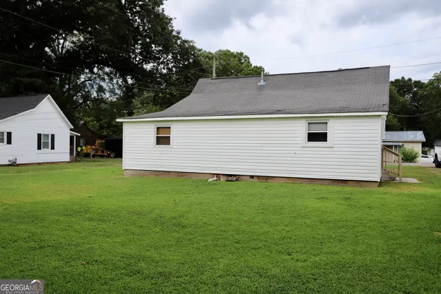 a view of a backyard with a garden