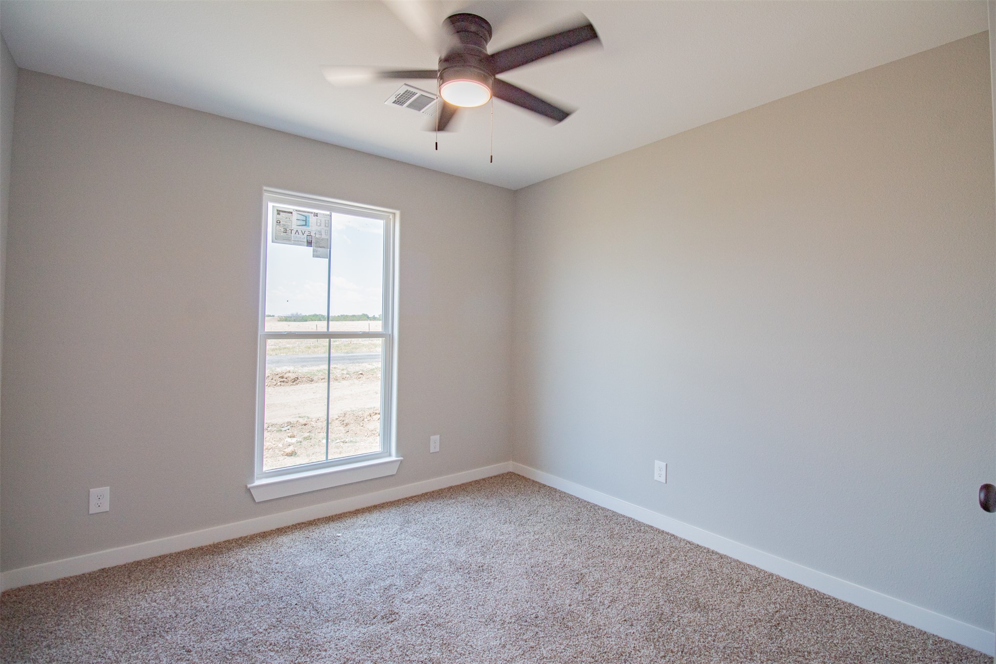 175 Treaty Road Calera, OK 74730 - Photo 25 of 25 Recessed lighting, ceiling fan with integrated light, neutral carpet flooring, and a single window with white trim