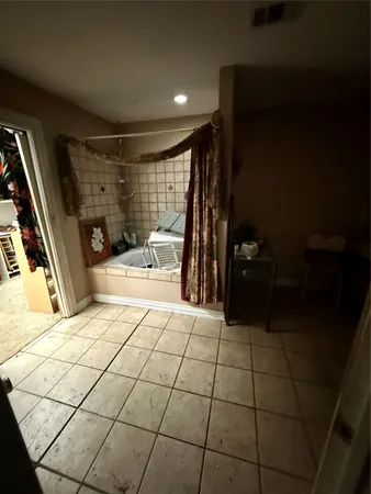 a view of a entryway door of the room