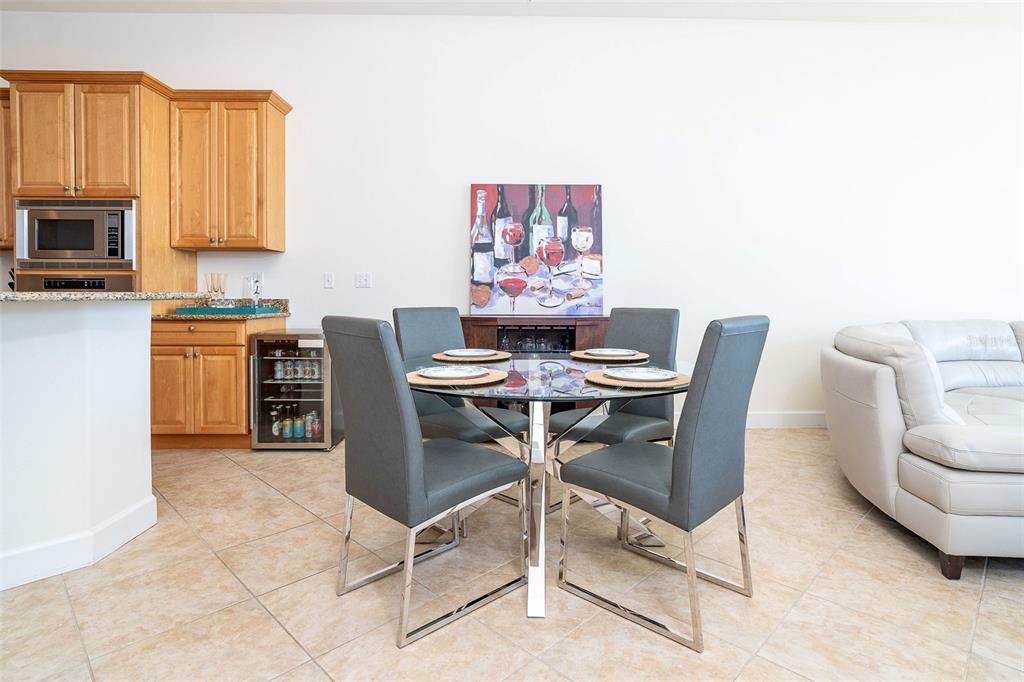 1375 Beach Road, Unit 309 Englewood, FL 34223 - Photo 20 of 45 a view of a dining room with furniture