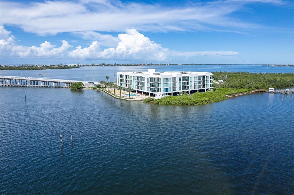 1375 Beach Road, Unit 309 Englewood, FL 34223 - Photo 2 of 45 a view of a lake with big yard