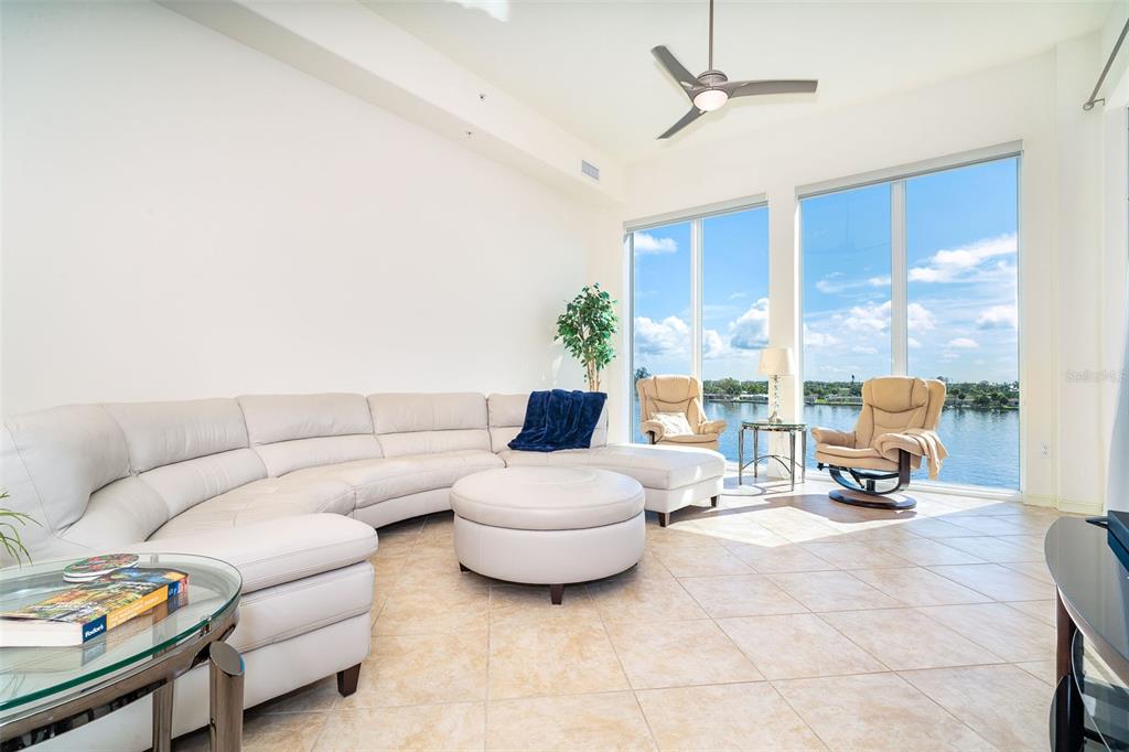 1375 Beach Road, Unit 309 Englewood, FL 34223 - Photo 24 of 45 a living room with furniture and a large window