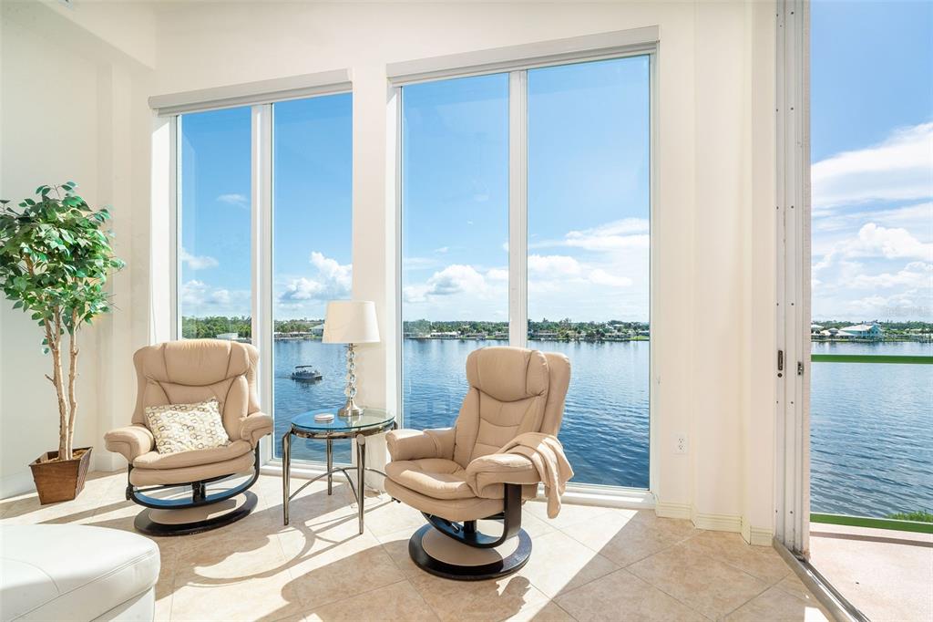 1375 Beach Road, Unit 309 Englewood, FL 34223 - Photo 26 of 45 a living room with furniture and a potted plant