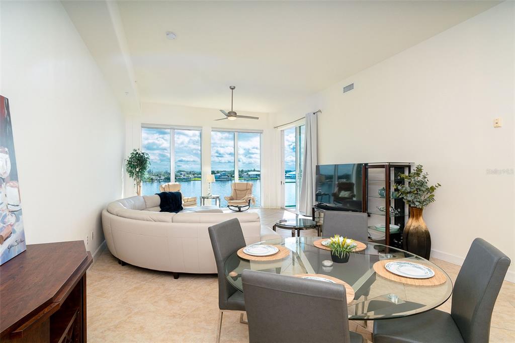 1375 Beach Road, Unit 309 Englewood, FL 34223 - Photo 35 of 45 a living room with furniture and a large window
