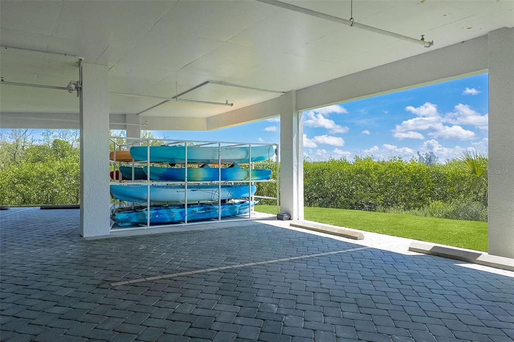 1375 Beach Road, Unit 309 Englewood, FL 34223 - Photo 42 of 45 a view of a room with wooden floor and windows