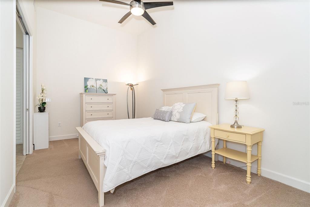 1375 Beach Road, Unit 309 Englewood, FL 34223 - Photo 10 of 45 a bedroom with a bed and a table