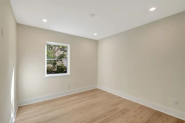 a utility room with sink dryer and washer