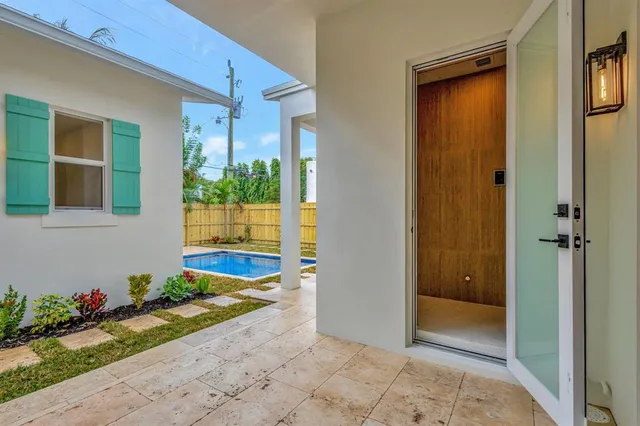 swimming pool with outdoor seating