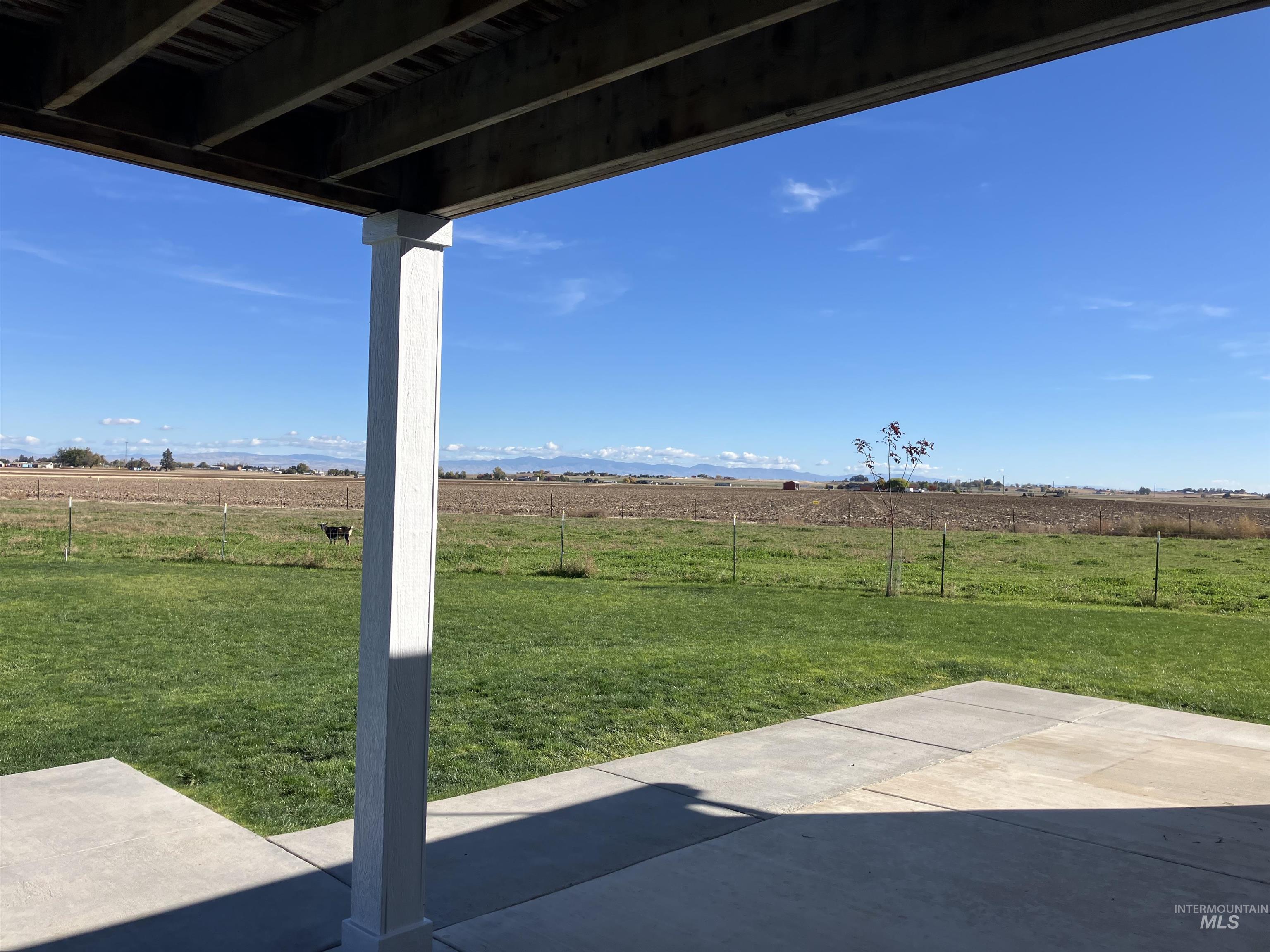 17530 Beet Road Caldwell, ID 83607 - Photo 11 of 50 View of yard with a view of rural / pastoral area and a patio