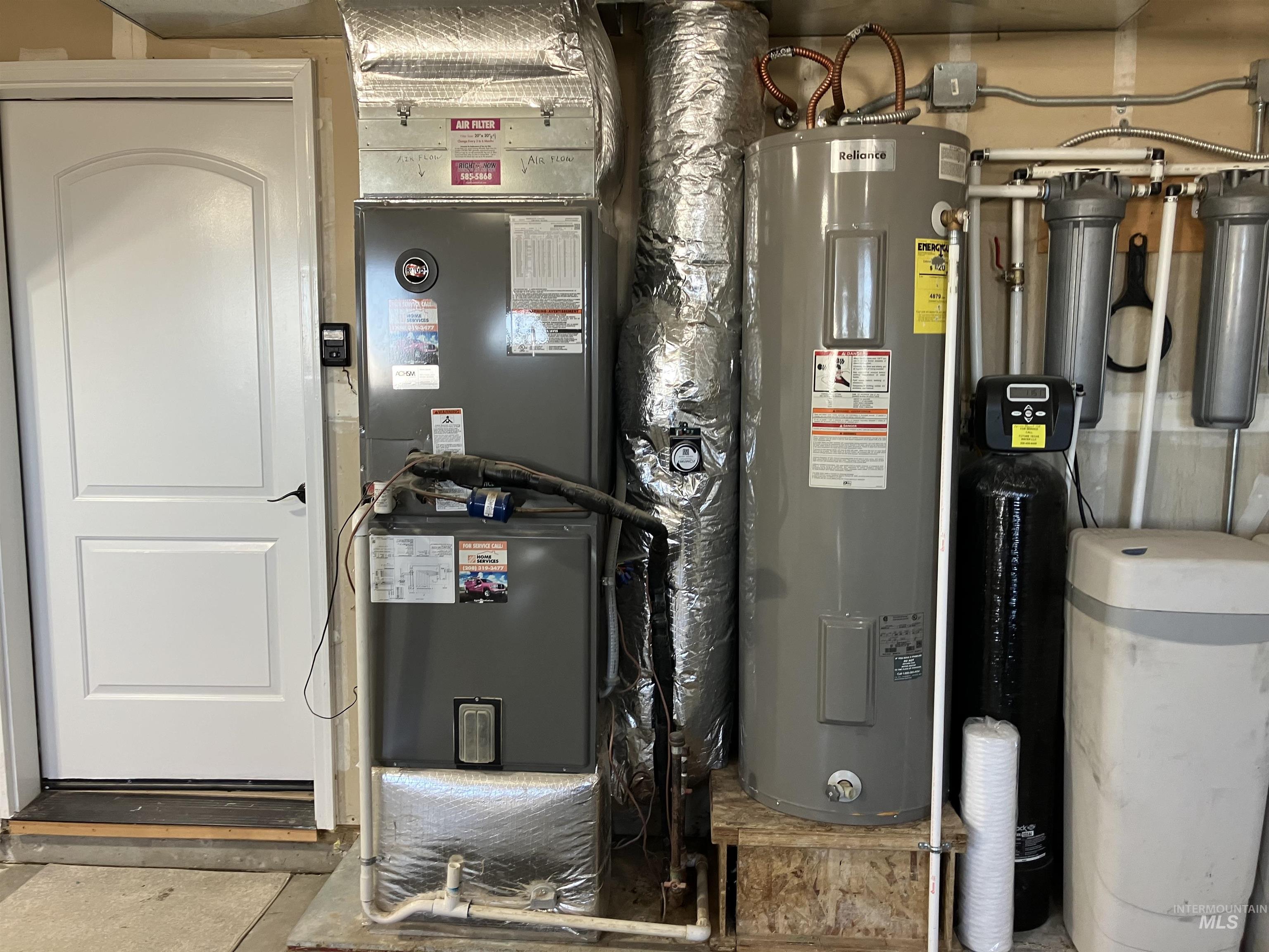 17530 Beet Road Caldwell, ID 83607 - Photo 45 of 50 Utility room featuring electric water heater and heating unit
