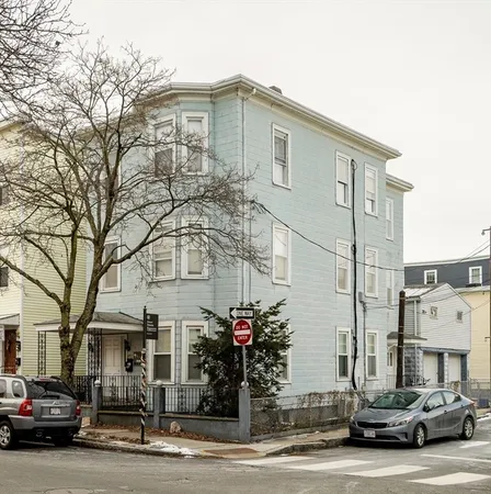 a car parked in front of a building