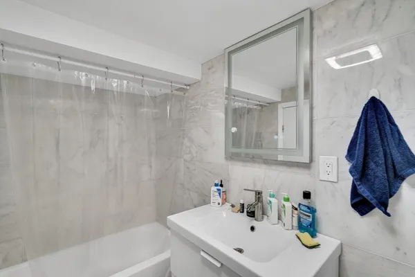 a bathroom with a sink and a bathtub