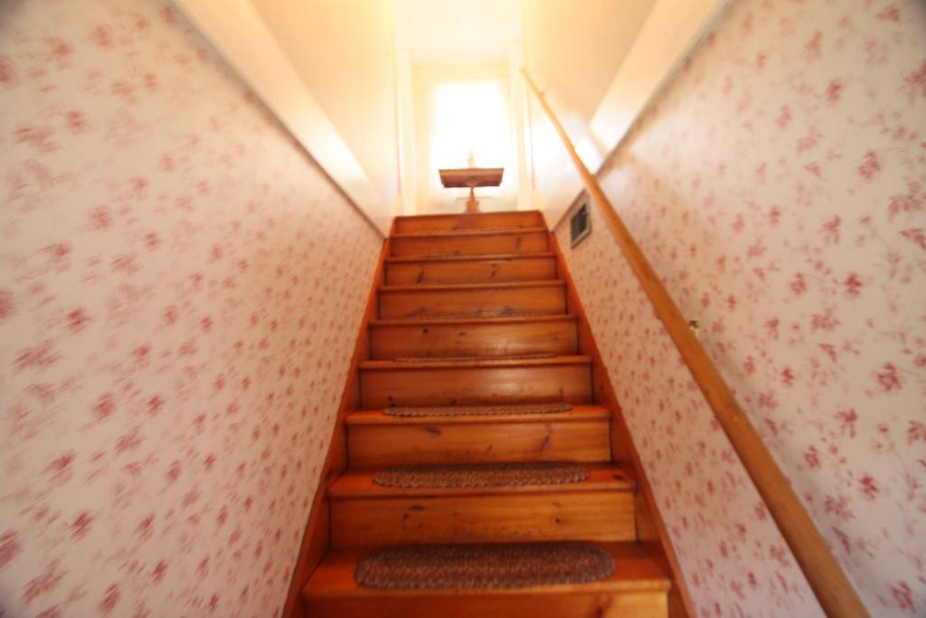 90 Bridgton Road Sebago, ME 04029 - Photo 13 of 22 Stairway to second floor.