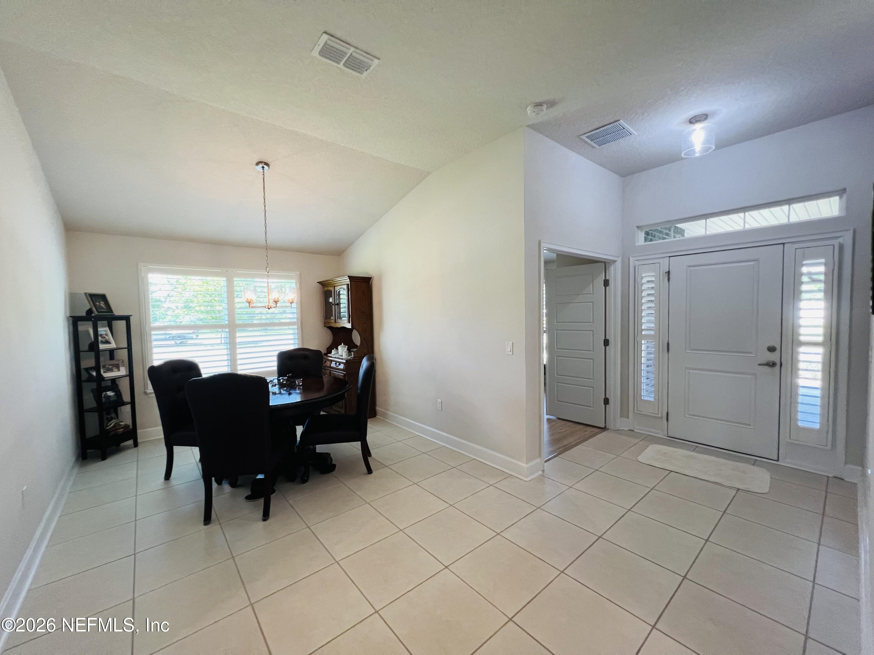 2 Rivertown Road Palm Coast, FL 32137 - Photo 47 of 80 a view of a livingroom with furniture