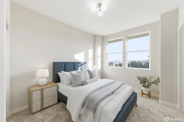 a view of swimming pool from a balcony