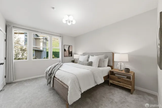 a view of a room with a large window