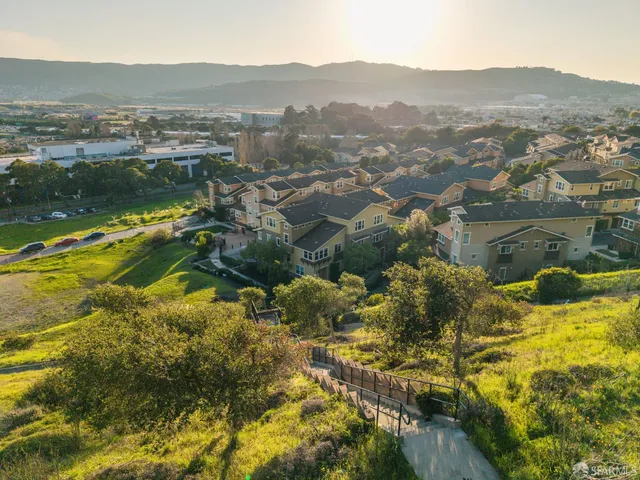 an aerial view of residential house with outdoor space and river