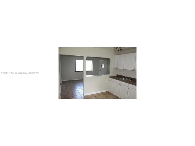 a hallway with a large window