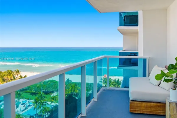 a view of a yard with an ocean view