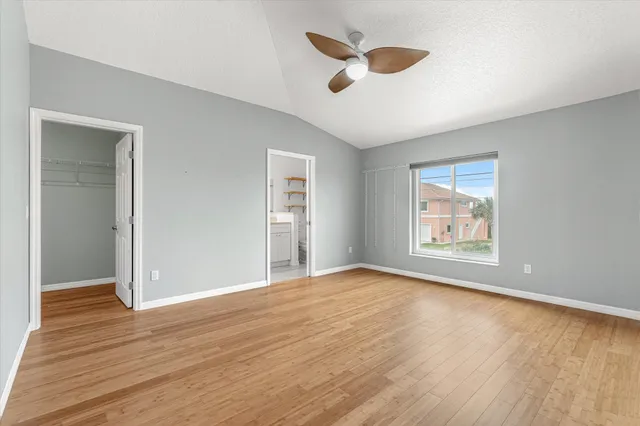 a kitchen with stainless steel appliances granite countertop a stove a refrigerator and a sink