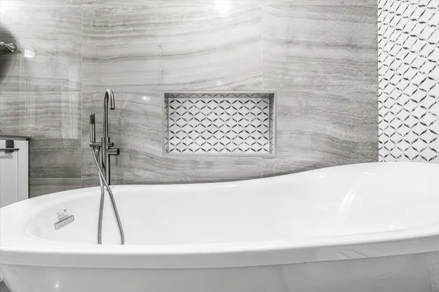 a bathroom with a toilet and a sink