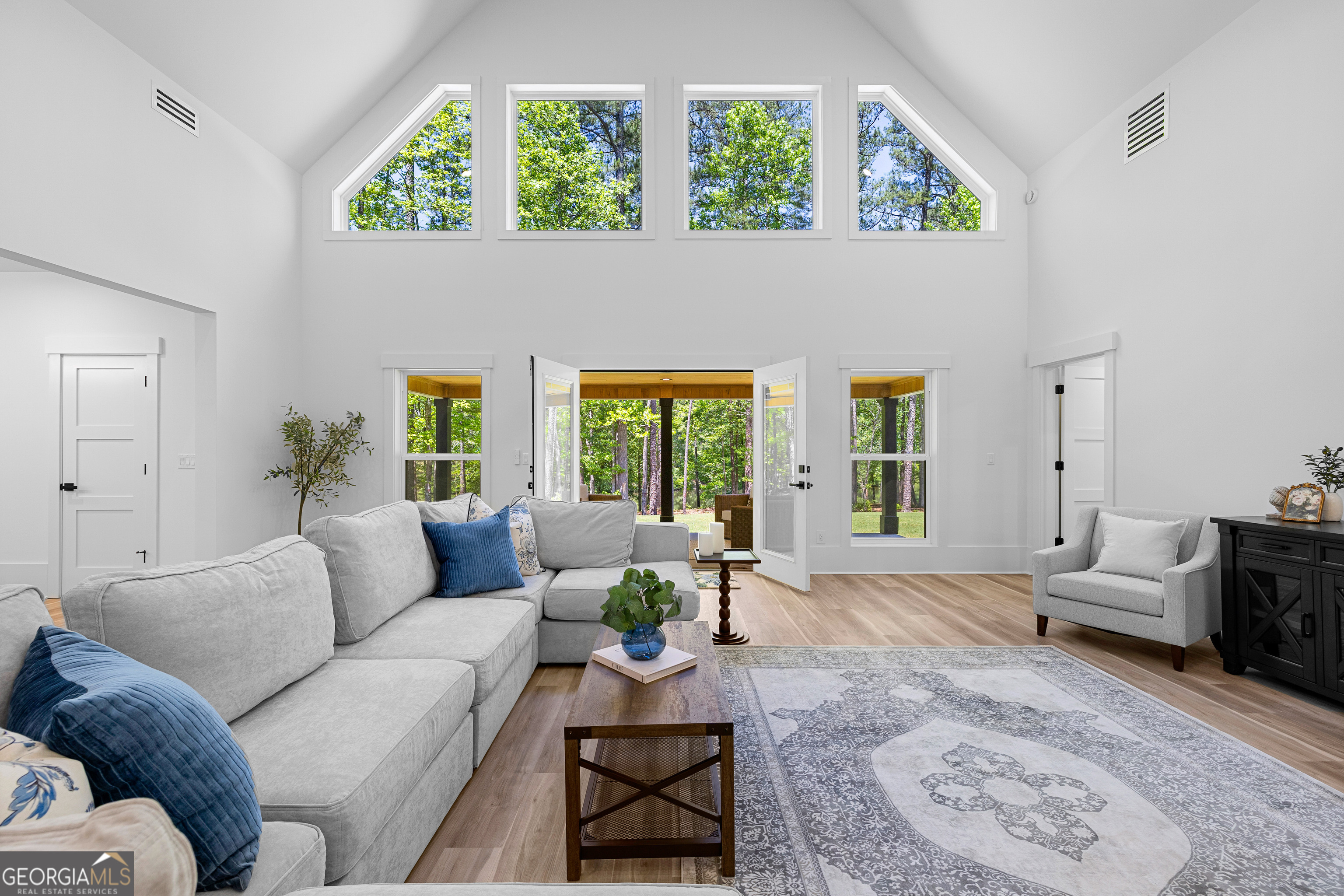 354 Turner Road Newnan, GA 30263 - Photo 59 of 79 a living room with furniture and a large window