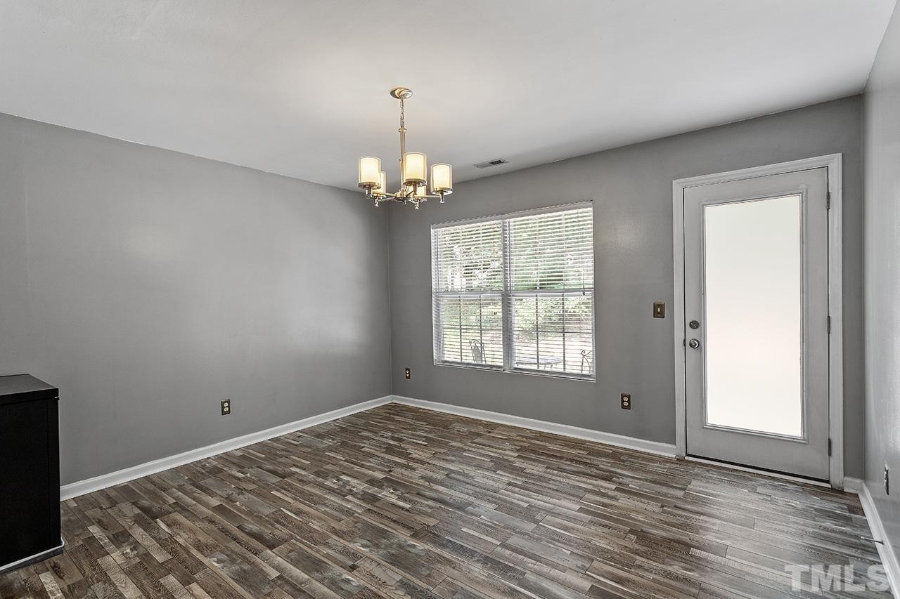 4236 Dalcross Road Raleigh, NC 27610 - Photo 8 of 14 a view of empty room with window