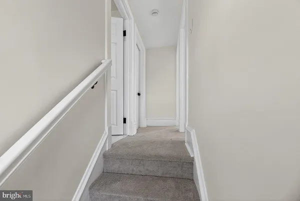 a view of hallway with stairs