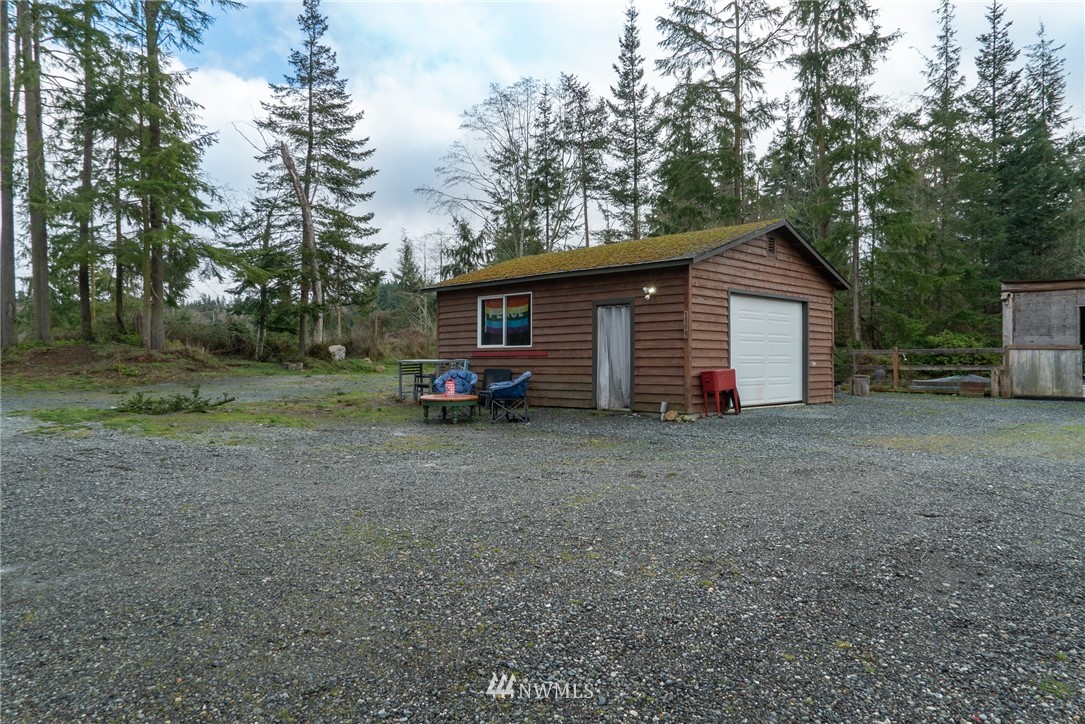 3399 East Harbor Road Langley, WA 98260 - Photo 13 of 36 a view of a house with backyard