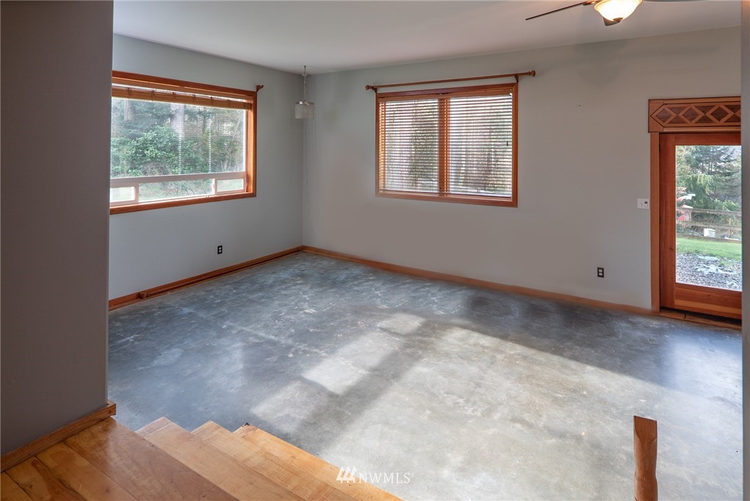 3399 East Harbor Road Langley, WA 98260 - Photo 24 of 36 a view of an empty room with windows